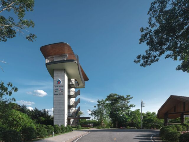 VISTEC campus lookout tower along a tree-lined road
