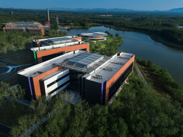 Aerial view of VISTEC academic buildings beside the campus lake
